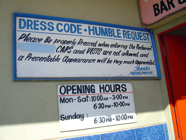Polite restaurant dress code sign