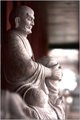 Thoughtful, in stone