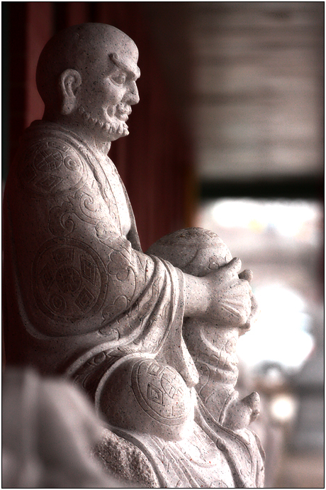 Thoughtful, in stone