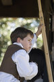 a boy playing with his stick