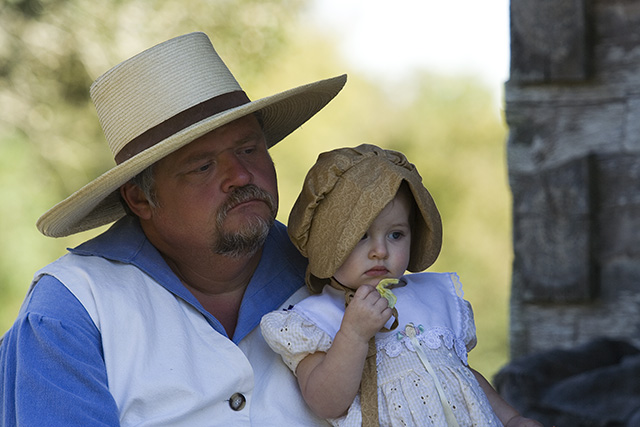 Holding his daughter