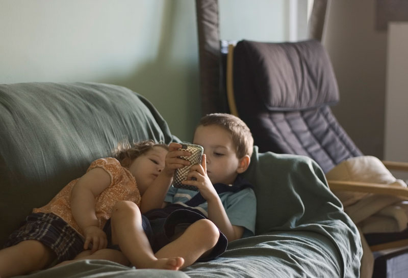 Siblings on the couch