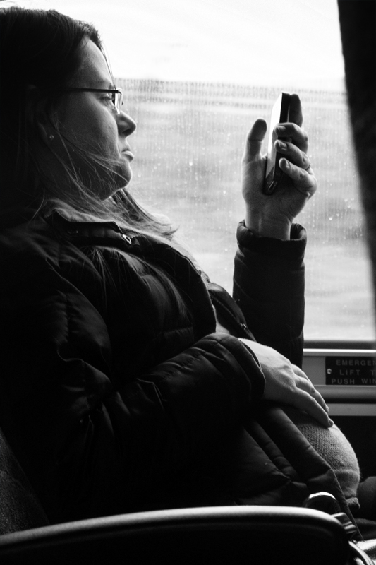 9 - Commuter with Child & Phone