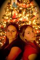 cousins in front of the Christmas tree